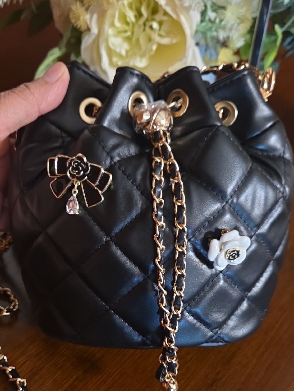 Black Quilted Bucket Bag with Floral Pins - Picture 6 of 14